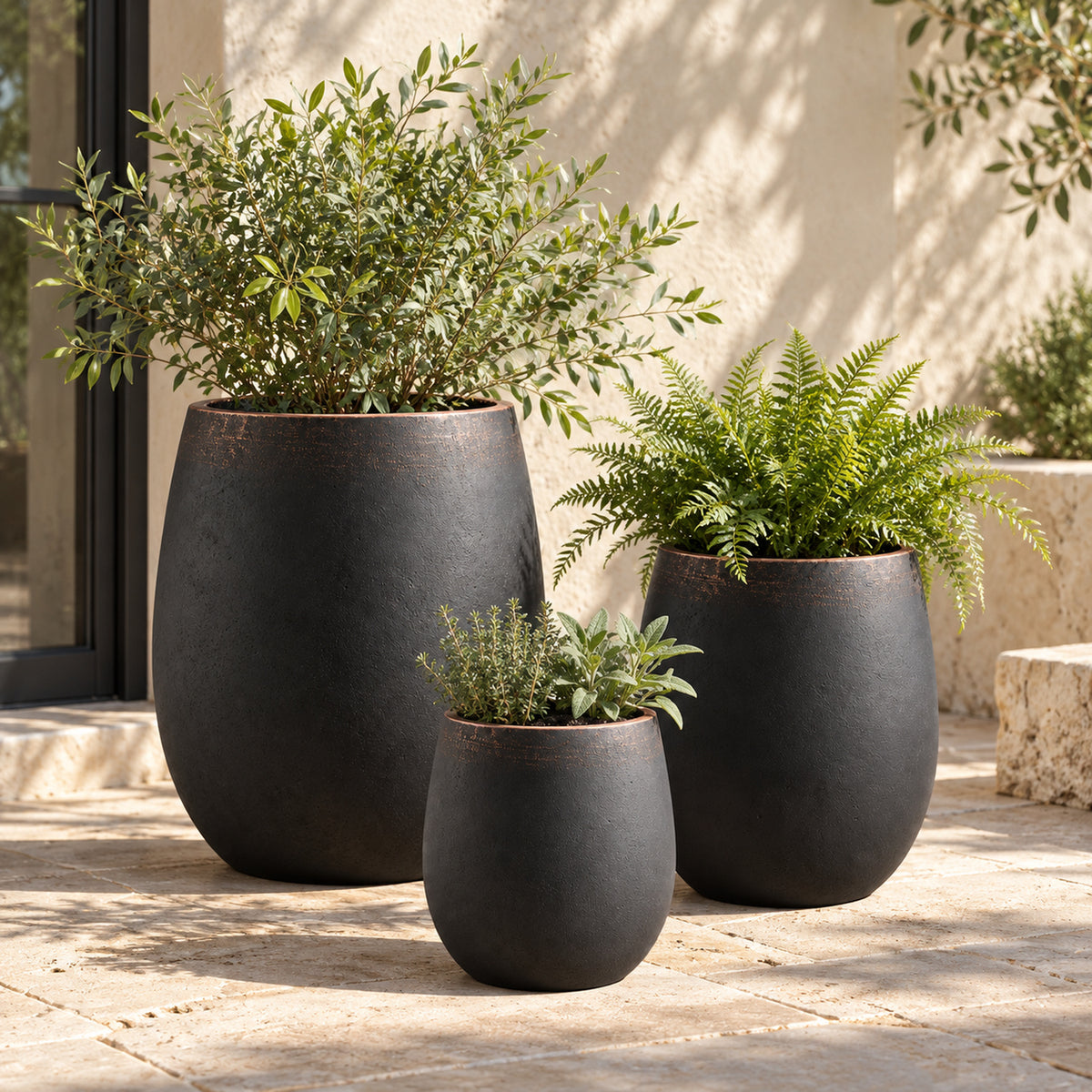 3-Piece Black Concrete Planter Set with Copper-Tone Rims